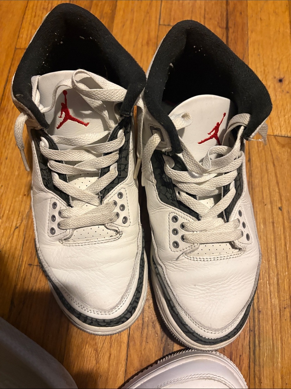 Jordan Men’s White/Black/Red Retro Leather Sneakers